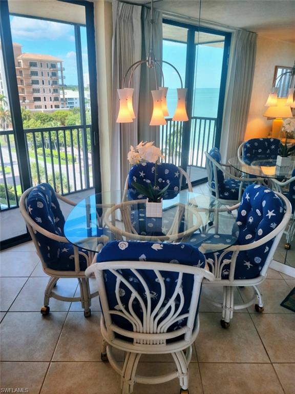 Game or work area with printer, bay views and open balcony