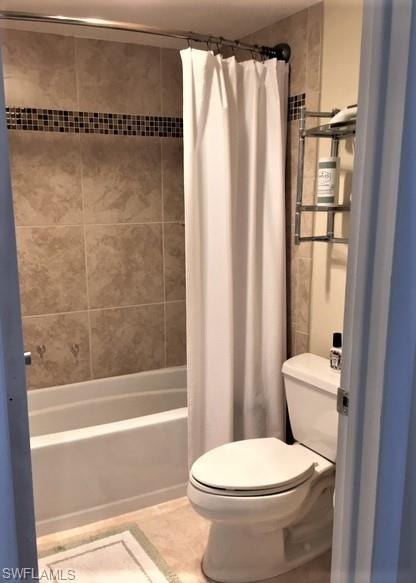 Tub with tiled surround provides for bathing and shower in privacy.
