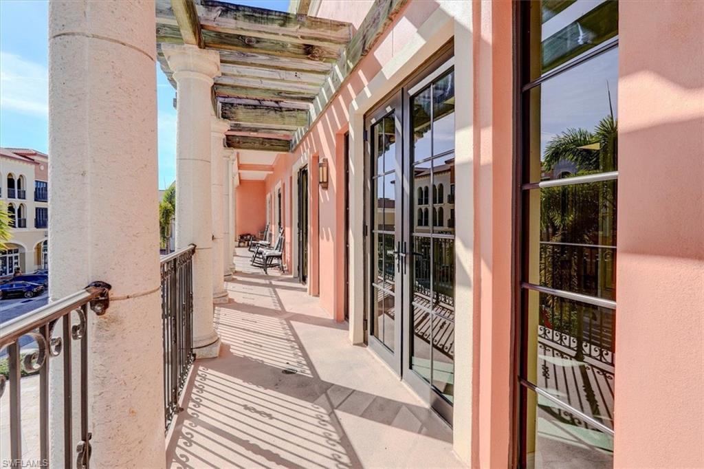 Balcony featuring french doors