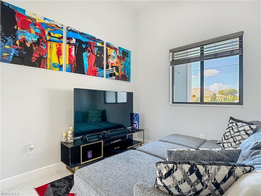 Bedroom featuring baseboards