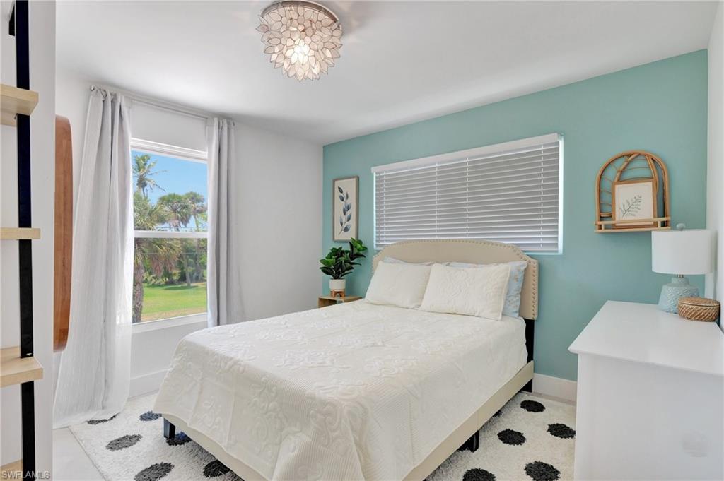 Bedroom featuring baseboards
