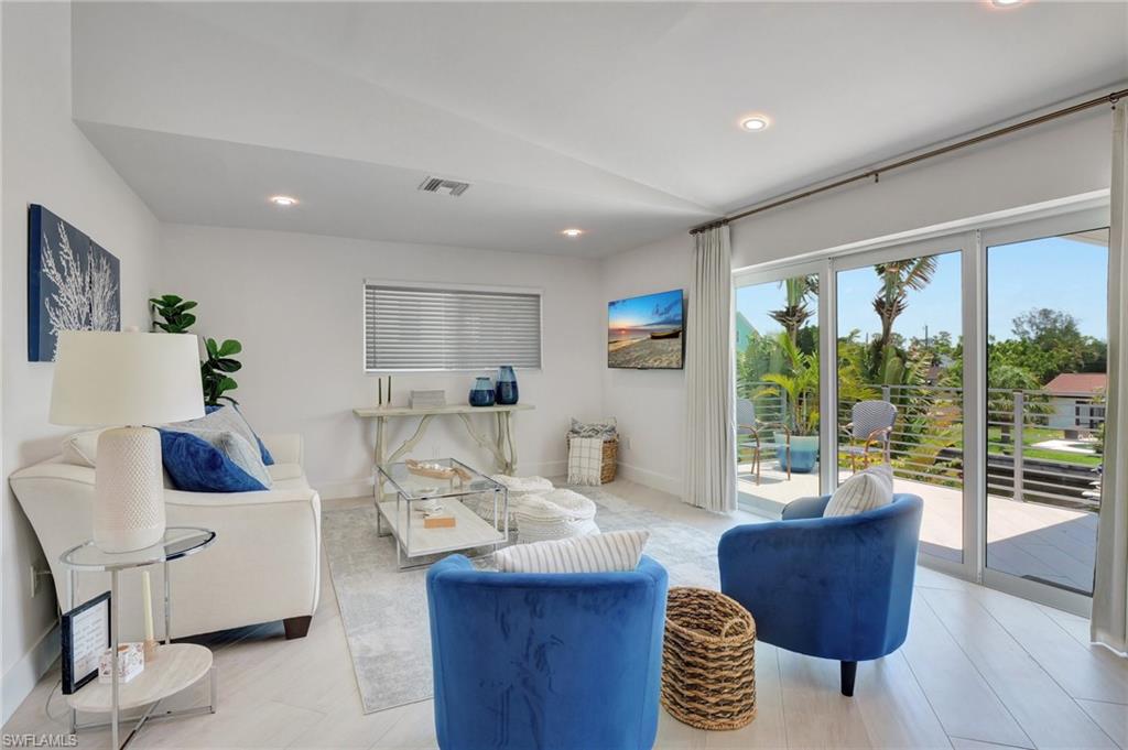 Living area featuring recessed lighting and light wood-style floors