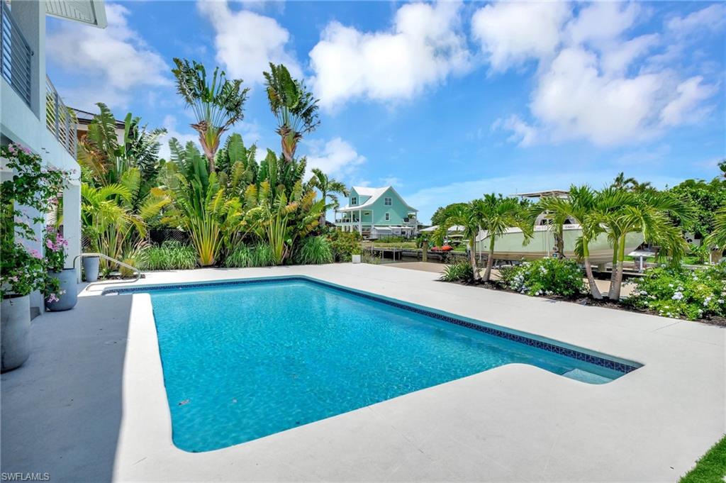 Outdoor pool with a patio
