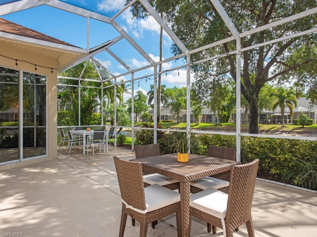 Screened-in patio with concrete flooring