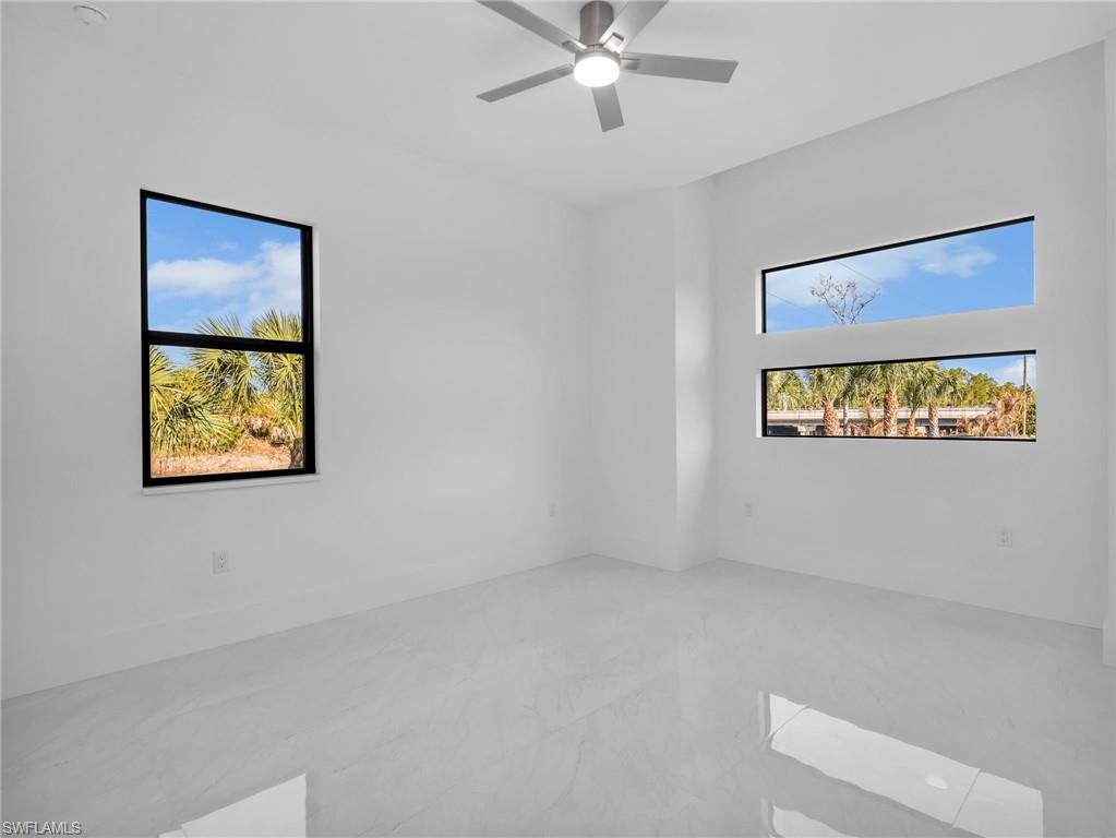 Spare room with a ceiling fan