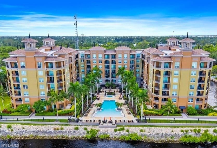 Bird's eye view of a pool and a large body of water