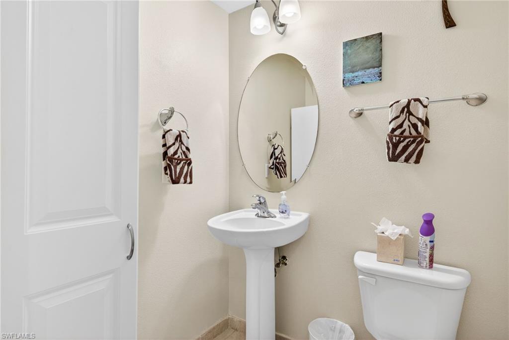 Half bathroom featuring toilet
