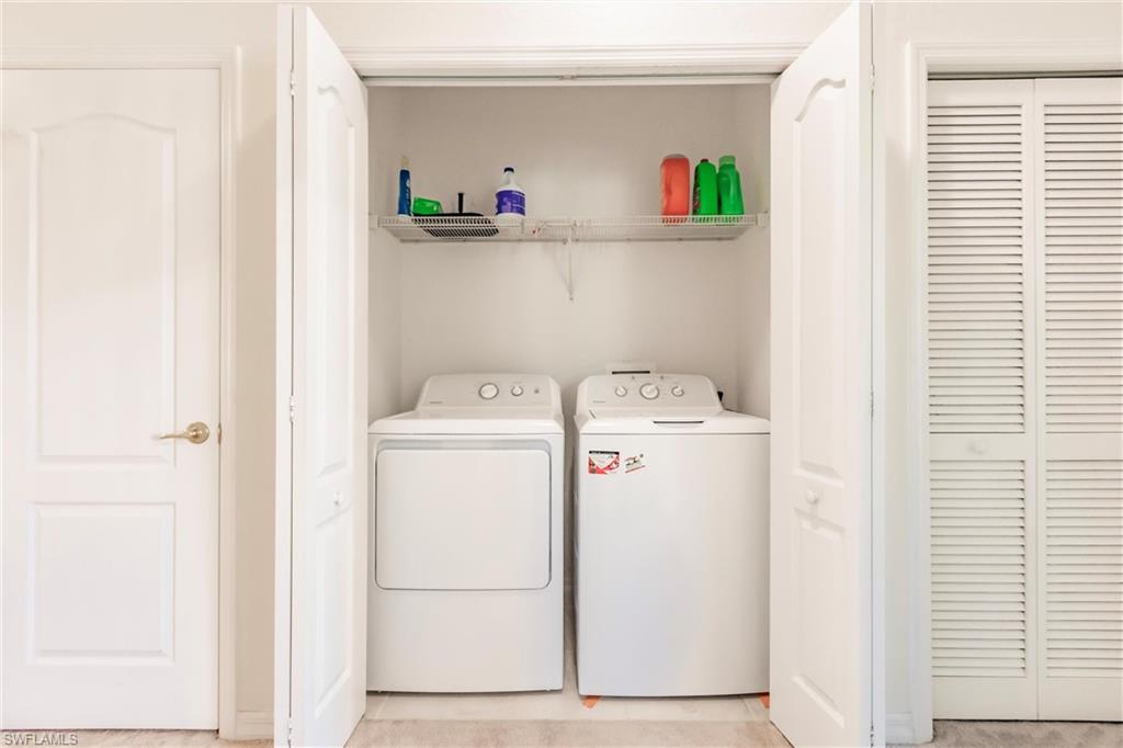 Laundry area featuring separate washer and dryer