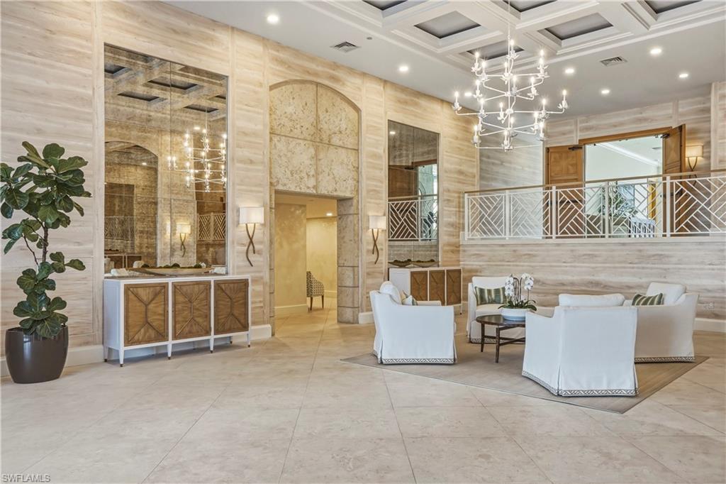 Building lobby with recessed lighting and high coffered ceiling