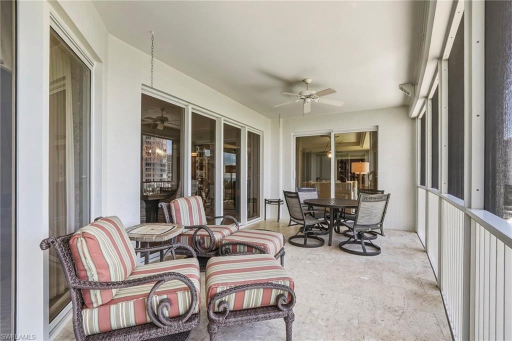 Lanai featuring a ceiling fan and outdoor dining space