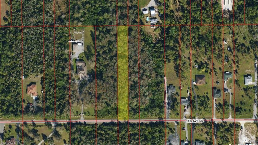 Aerial overview of property's location featuring property parcel outlined