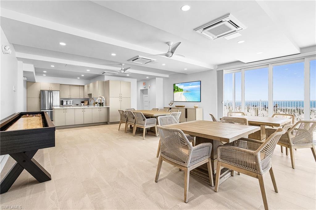 Egret community club  room comes complete with 2 pool baths, shuffleboard, kitchen area for food prep and entertaining, refrigerator, microwave, sink, and plenty of storage to host your favorite events.
