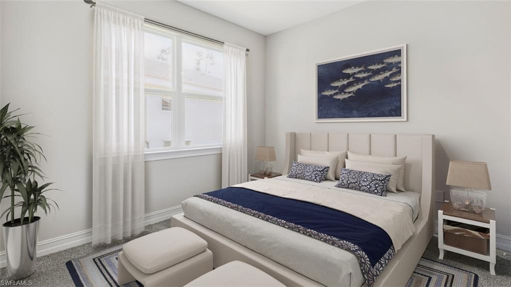This image is virtually staged. Bedroom with carpet flooring and baseboards