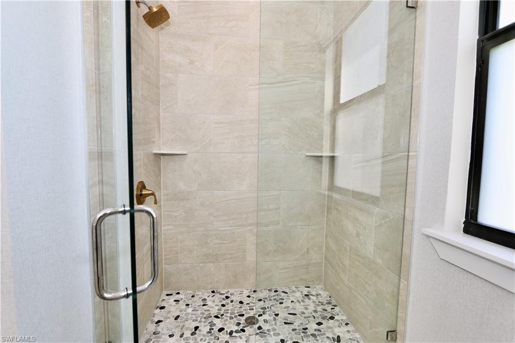 Bathroom featuring a stall shower