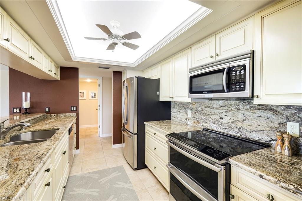 Upper Level Granite Counters and Backsplash, Lighted Tray Ceiling