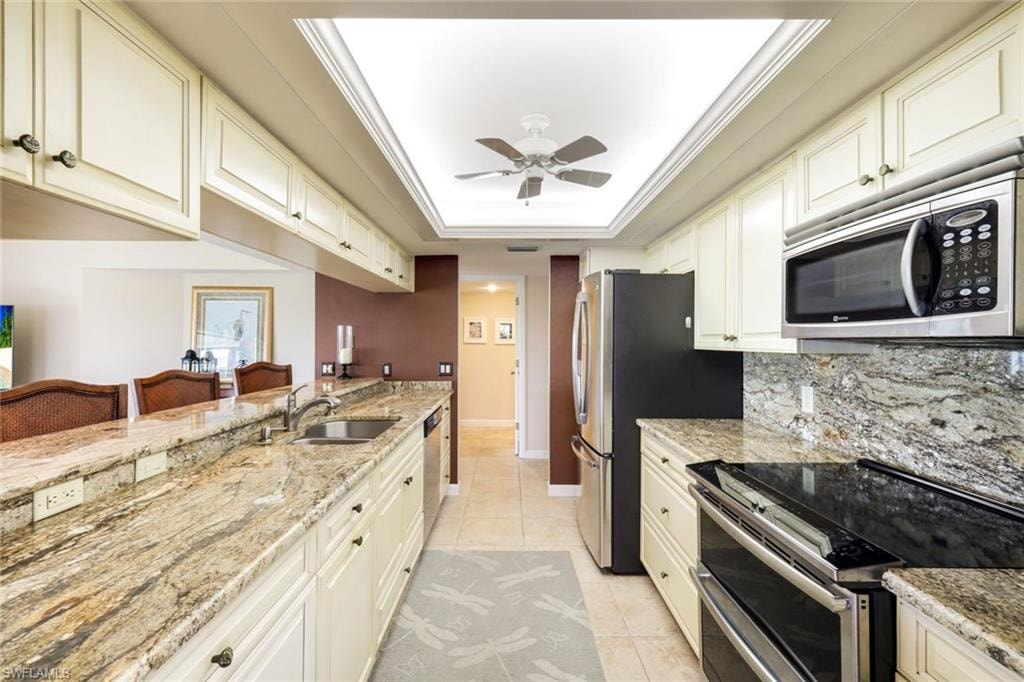Stainless Steel Appliances with Double Oven, Quiet Dishwasher, Wood Cabinetry w Pull outs