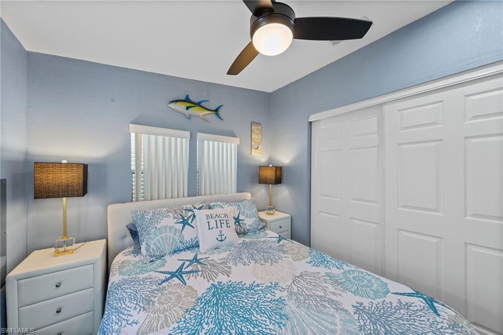 Bedroom featuring a closet and a ceiling fan