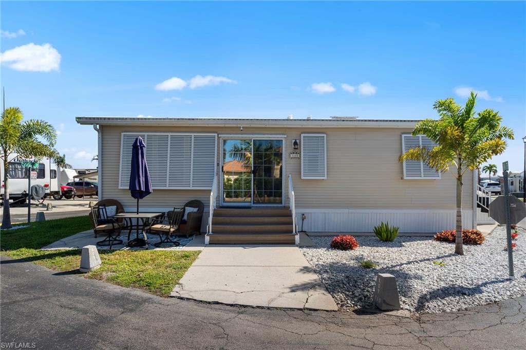 Manufactured / mobile home featuring entry steps and a patio area