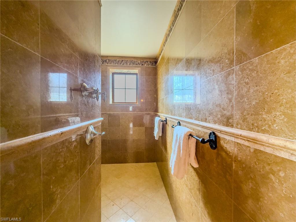 Bathroom featuring a walk in shower