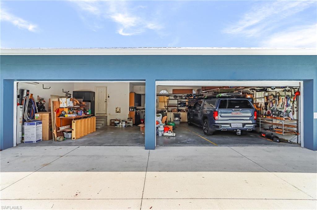 Garage with concrete driveway