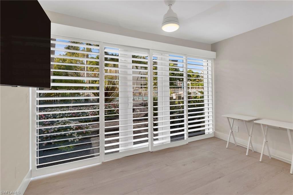 Detailed view of baseboards and wood finished floors