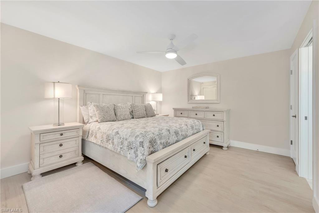 Bedroom featuring a ceiling fan and light wood-style flooring