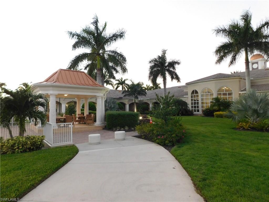View of community with green space a gazebo