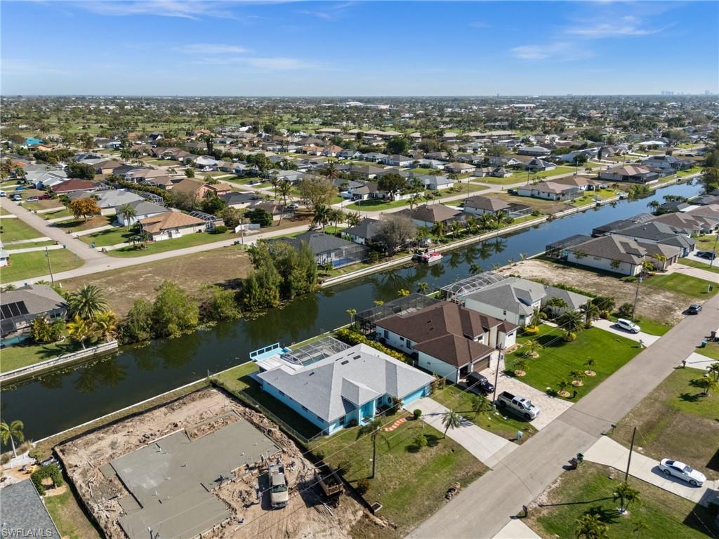 View of property location featuring nearby suburban area on a canal