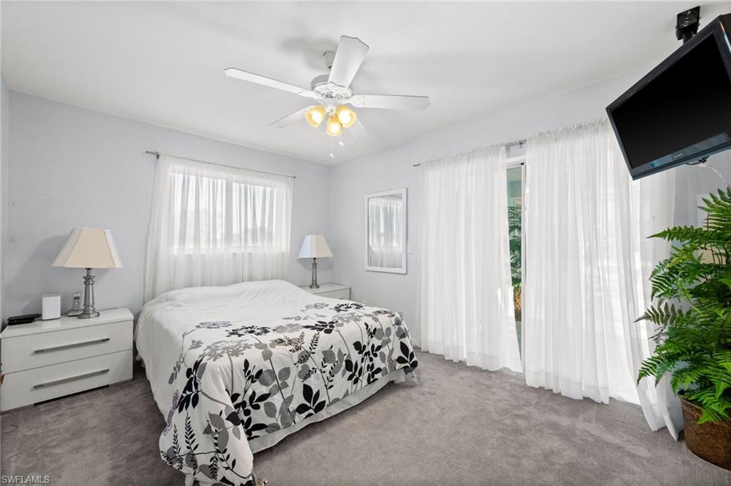 Bedroom with carpet floors and ceiling fan