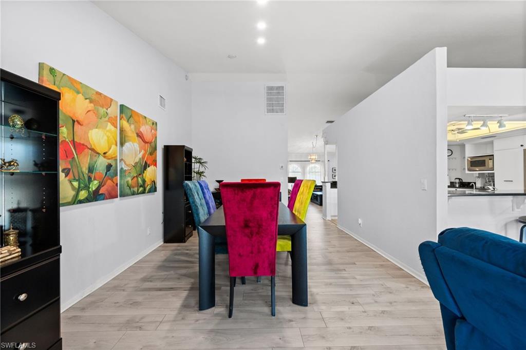 Dining room with light wood-style floors
