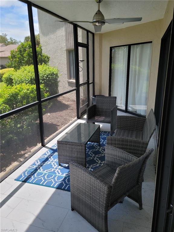 Screened lanai overlooking golf course.