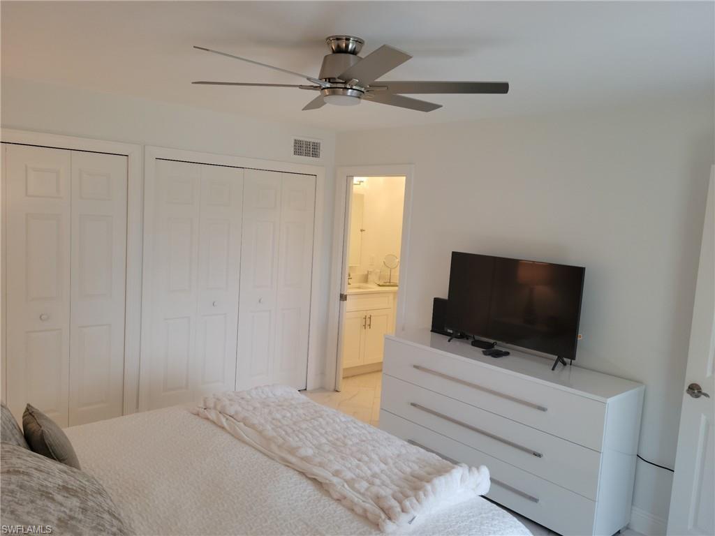 Owner's Suite with full bath, 2 closets, TV, lighted ceiling fan.