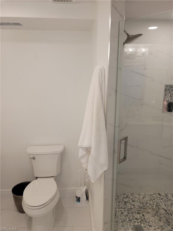 Master bath with tiled shower.