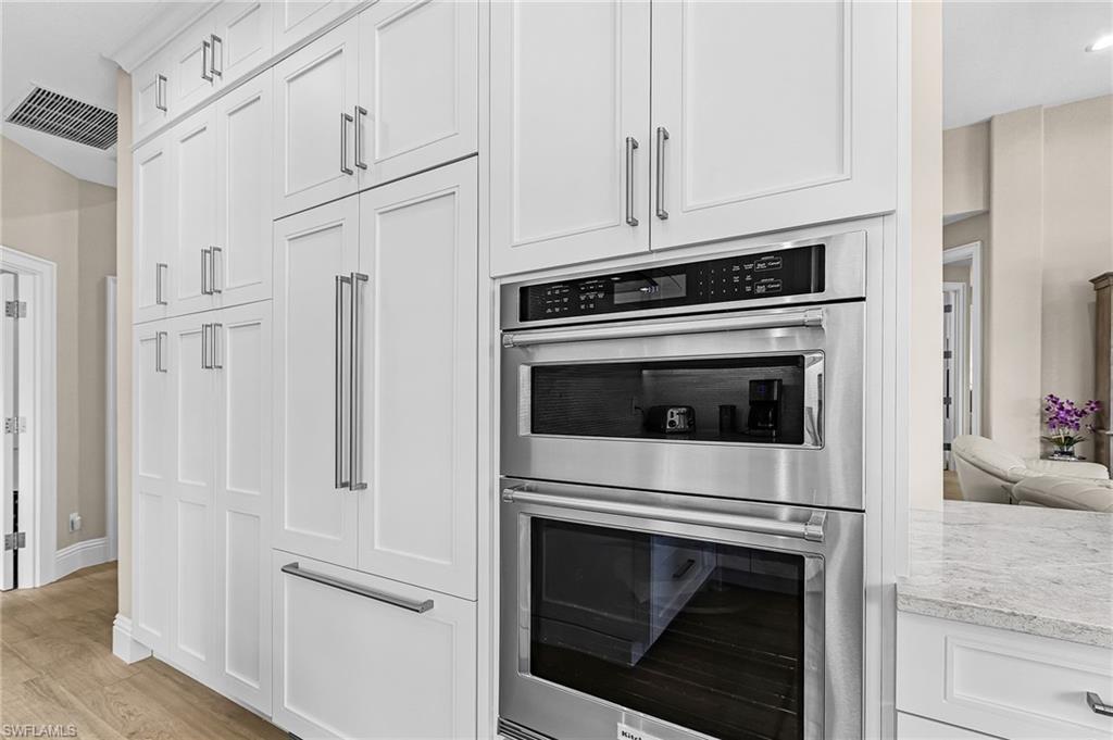 Kitchen with professional grade appliances and custom cabinetry