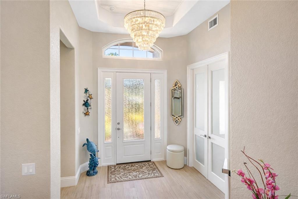 Grand Entry, Chandelier, Porcelain Tile Flooring
