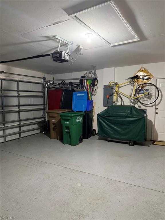 Garage with a garage door opener and electric panel