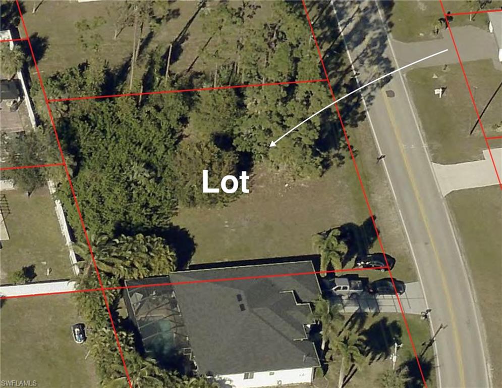 Aerial overview of property's location featuring property parcel outlined