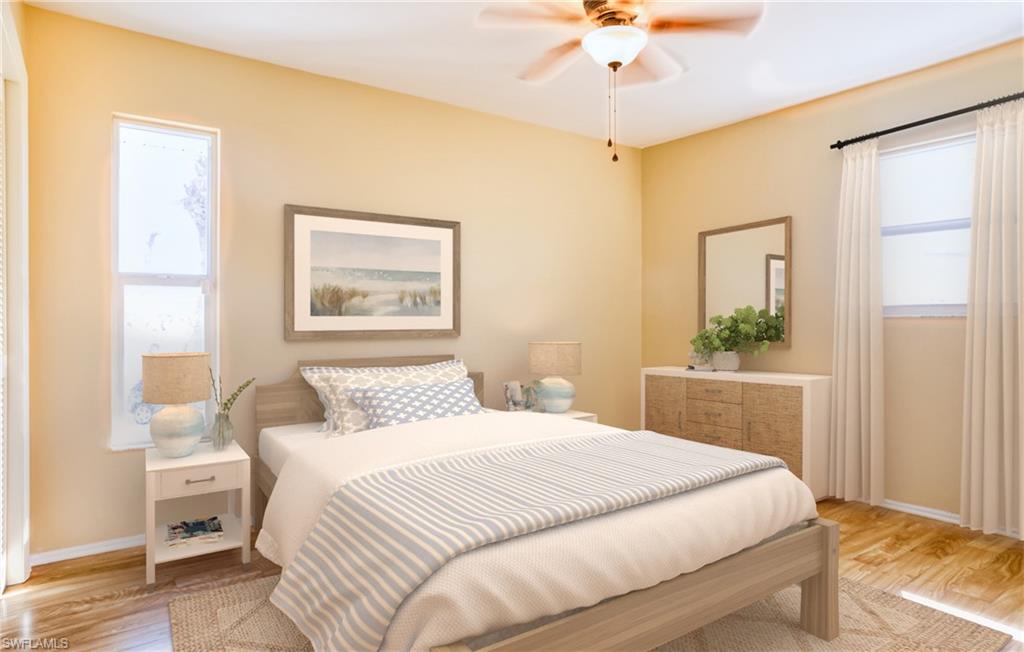 Bedroom featuring light wood-style floors and ceiling fan