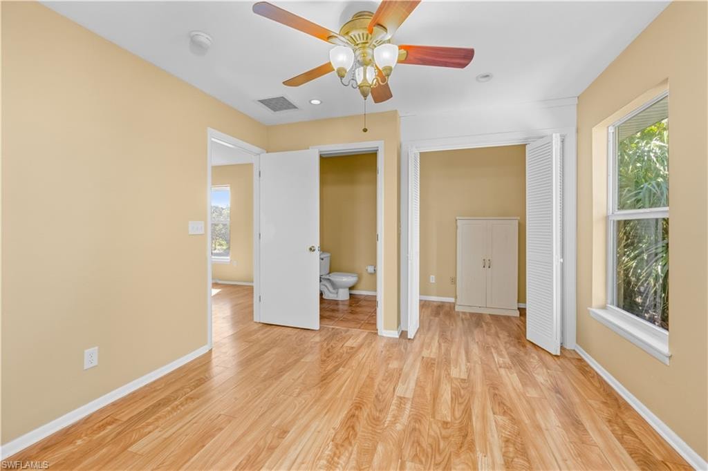 Unfurnished bedroom featuring light wood finished floors, ceiling fan, and recessed lighting