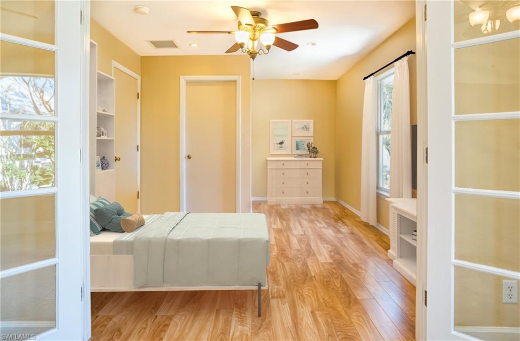 Bedroom featuring light wood-style floors and ceiling fan