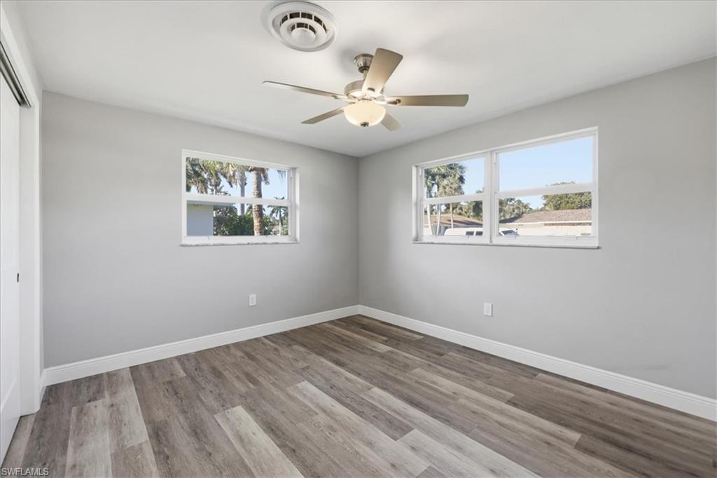 Unfurnished #2 room with light wood-style floors and ceiling fan