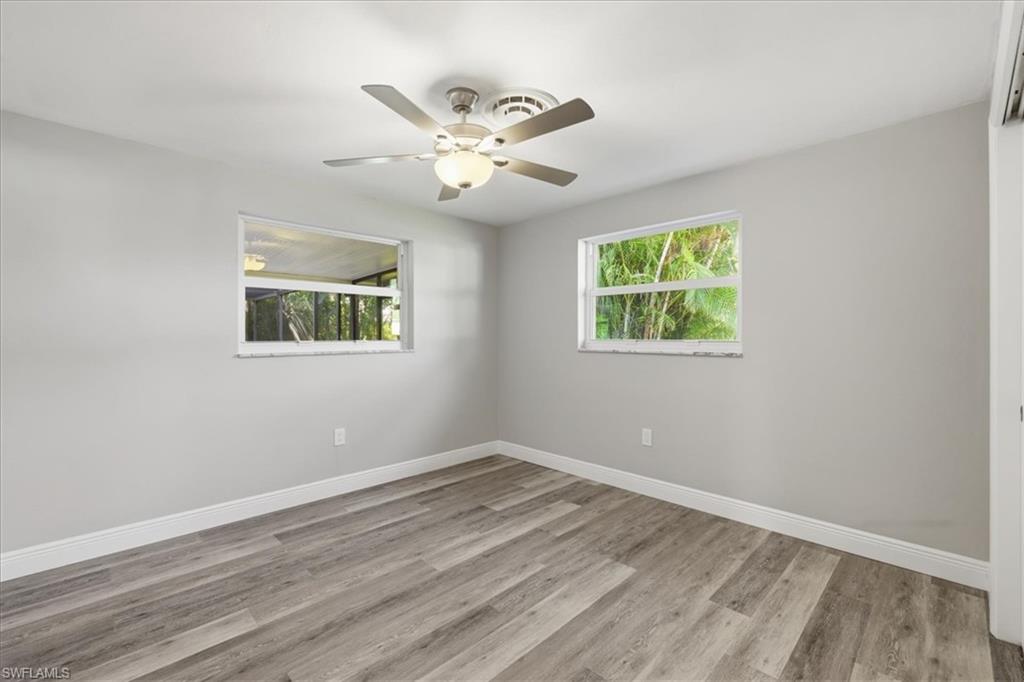 Unfurnished room #1 with a ceiling fan and light wood finished floors