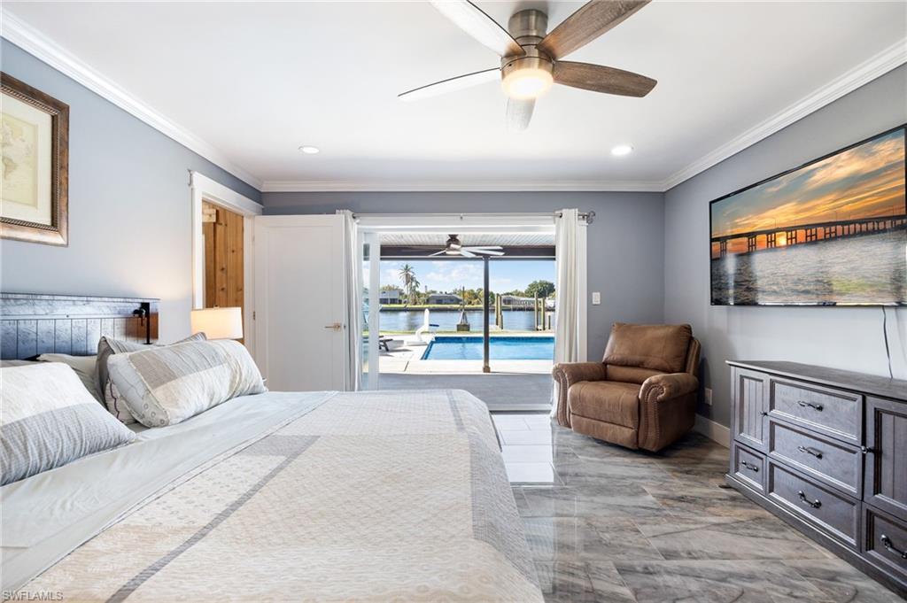 Bedroom featuring access to outside, ceiling fan, recessed lighting, a sunroom, and crown molding