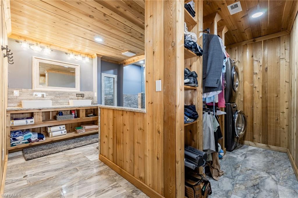 Storage featuring stacked washing machine and dryer