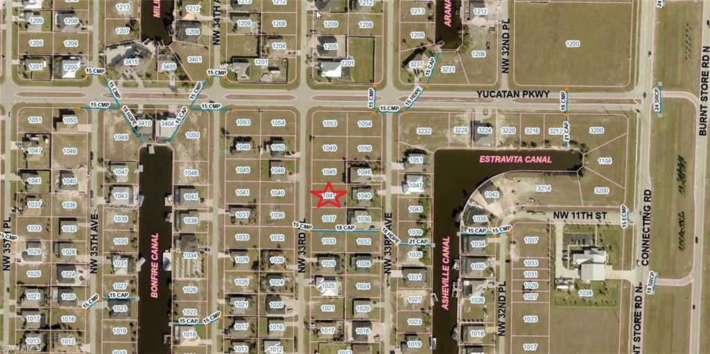 Aerial view of property's location & surrounding area.