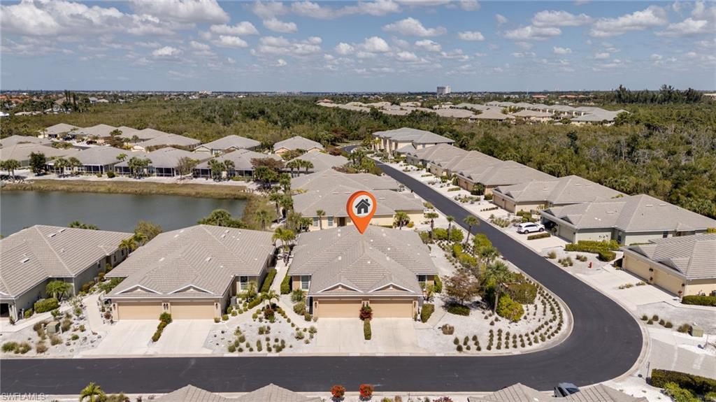 Aerial view of residential area with a nearby body of water