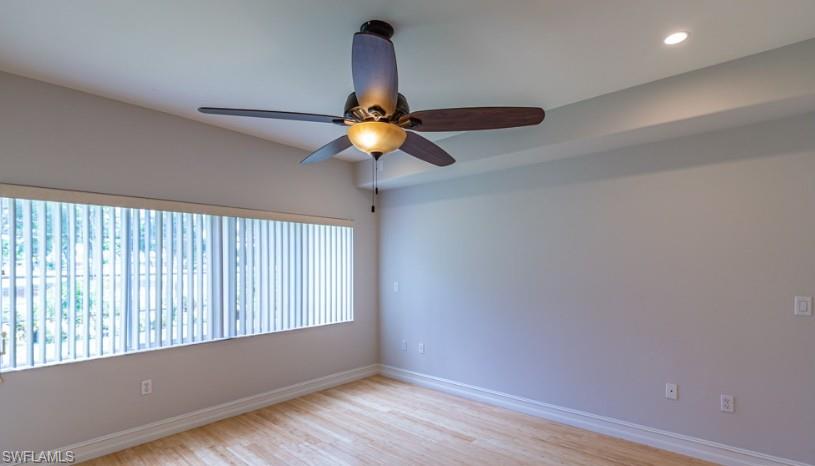 Empty room with recessed lighting, baseboards, light wood-style floors, and a ceiling fan