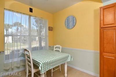 featuring light tile  floors