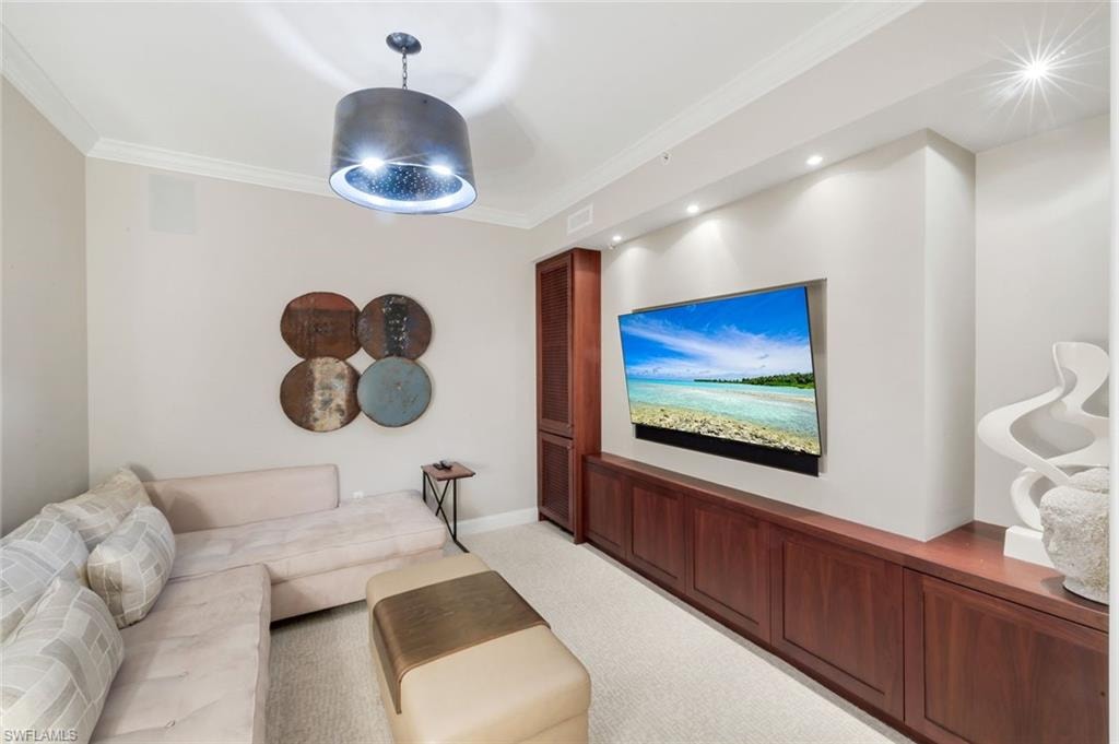 Movies, sports or media room with built in sound system and refrigeration