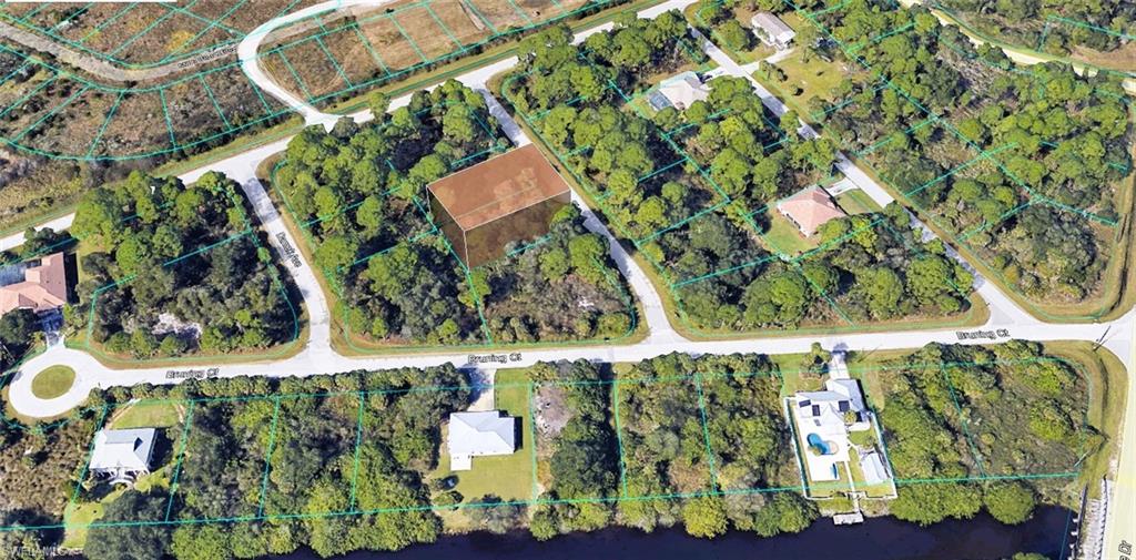 Aerial overview of property's location featuring property parcel outlined